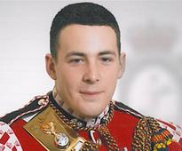 Slain Britishsoldier was'loving father'
