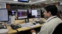 China data, U.S. Fed remarks send stocks into a tailspin