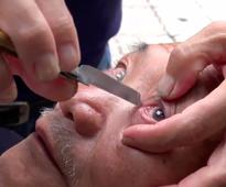 This Eyeball Shaving Barber Is Too Cutting-Edge For Us