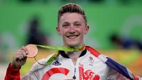 Watch this Olympic gymnast and his mates use their skills to get dressed