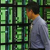 Asian stocks cheered by Fed reassurance, yen awaits BOJ